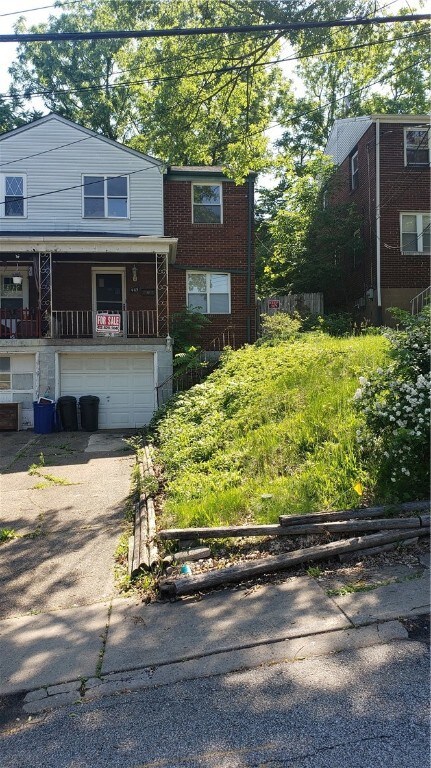 The garage & driveway parking is a real plus in th