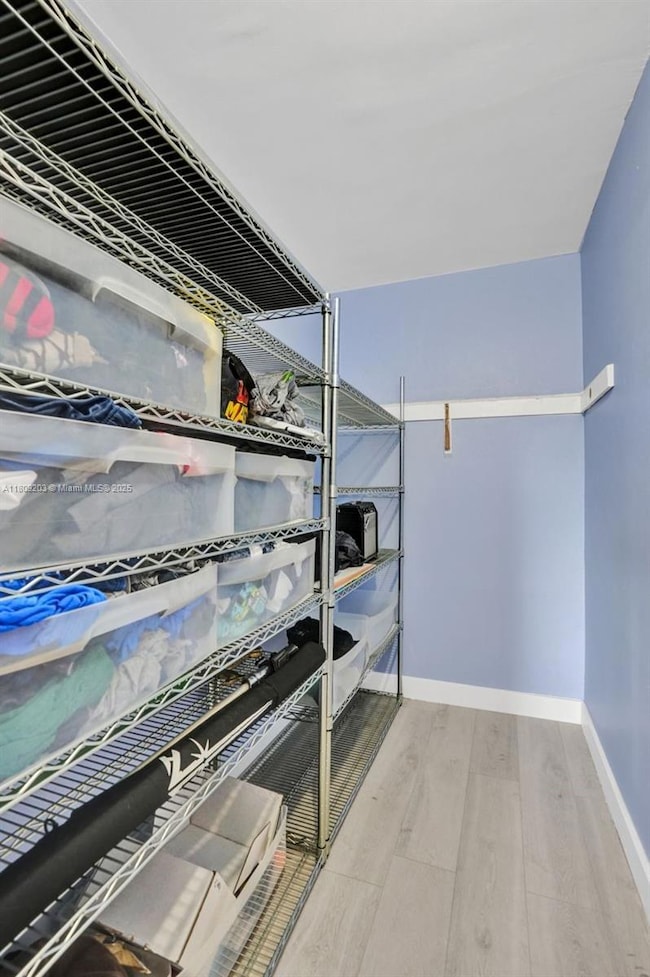 Deep closet on other wall in bedroom