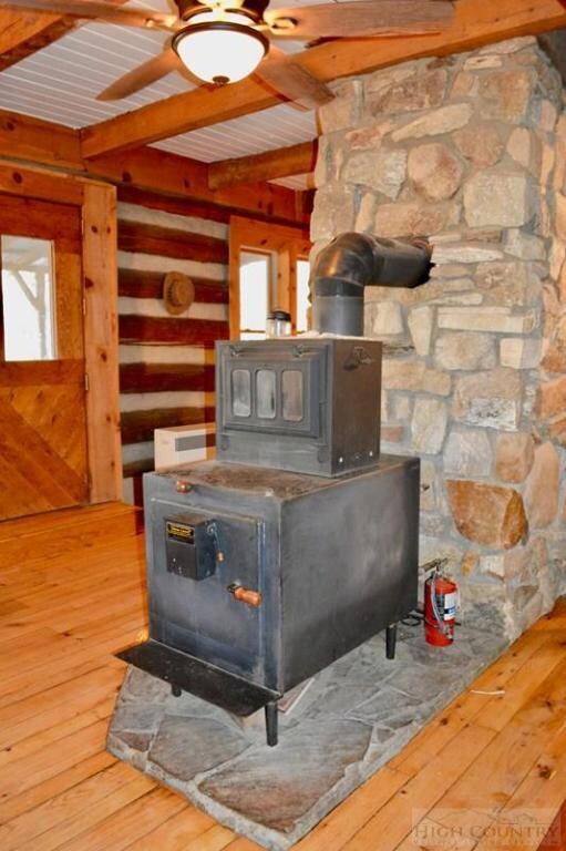 Wood stove and stone chimney: This beauty will hea