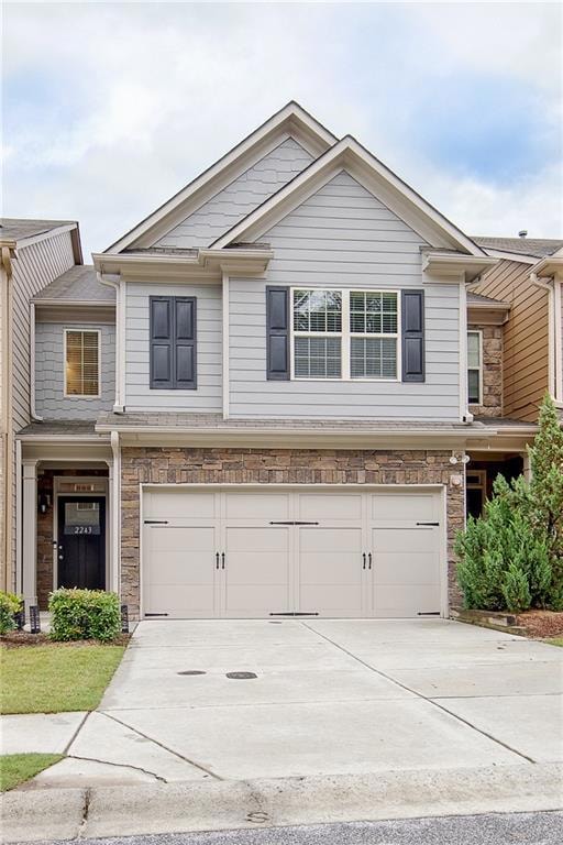Multi unit property featuring an attached garage, 