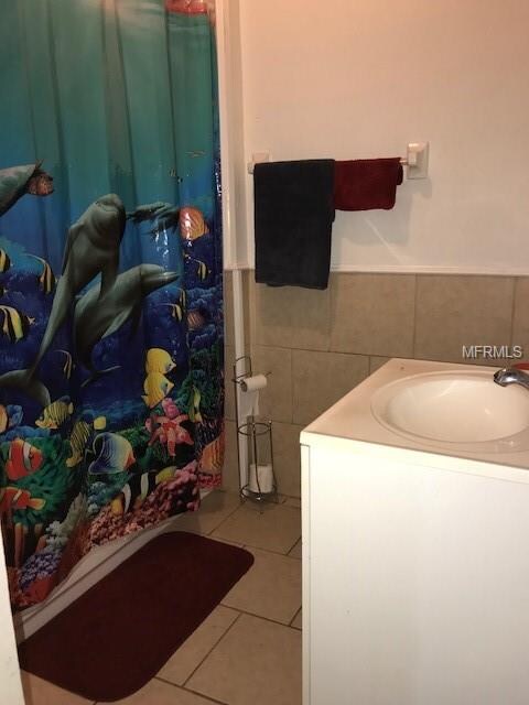 Bathroom with tub shower combo