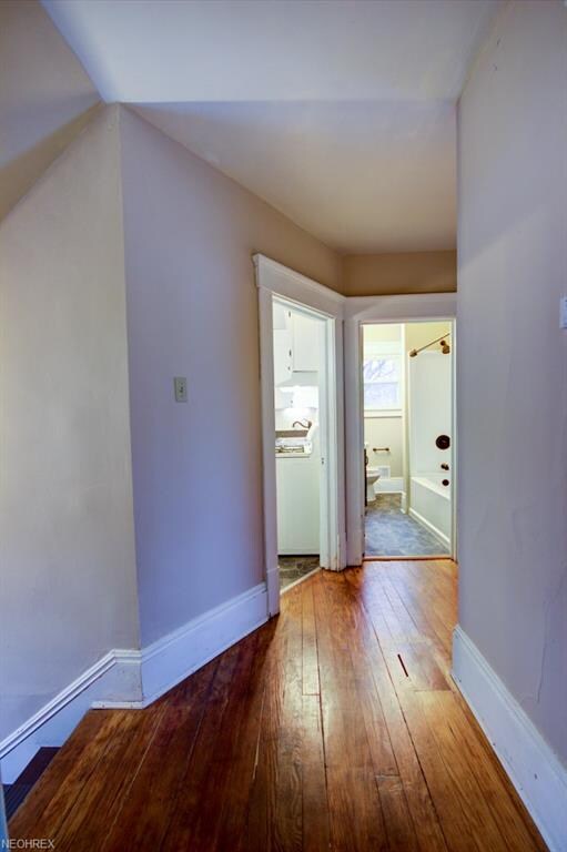 Hallway of 2nd floor unit. Beautiful refinished ha