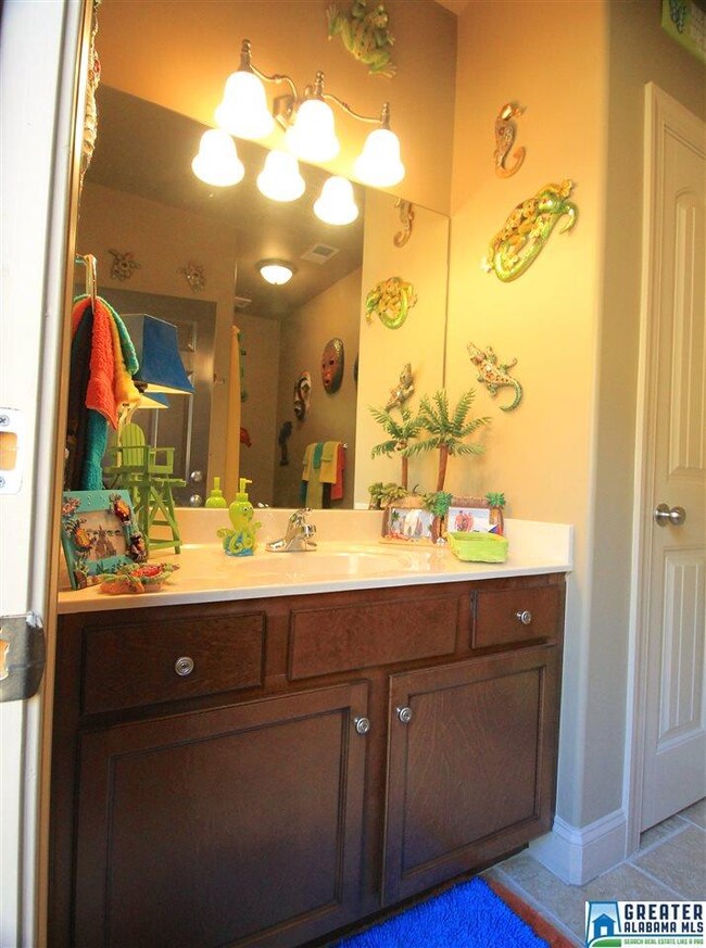 4th full bathroom that is accessed from outside for pool area.