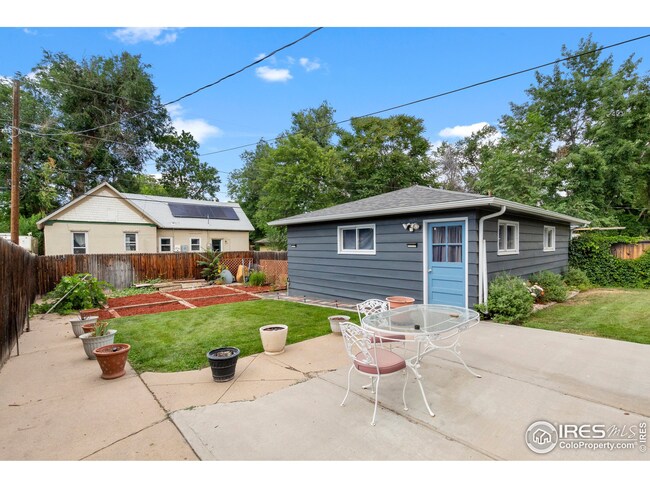 Fenced backyard and garden area