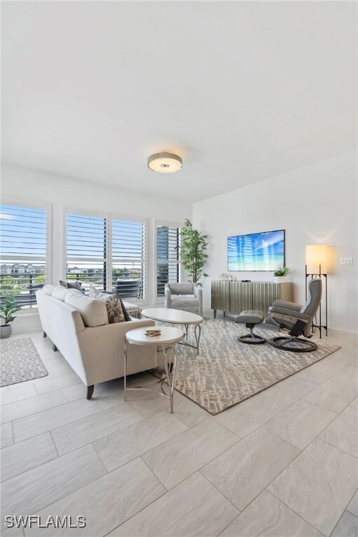 Living room featuring plenty of natural light