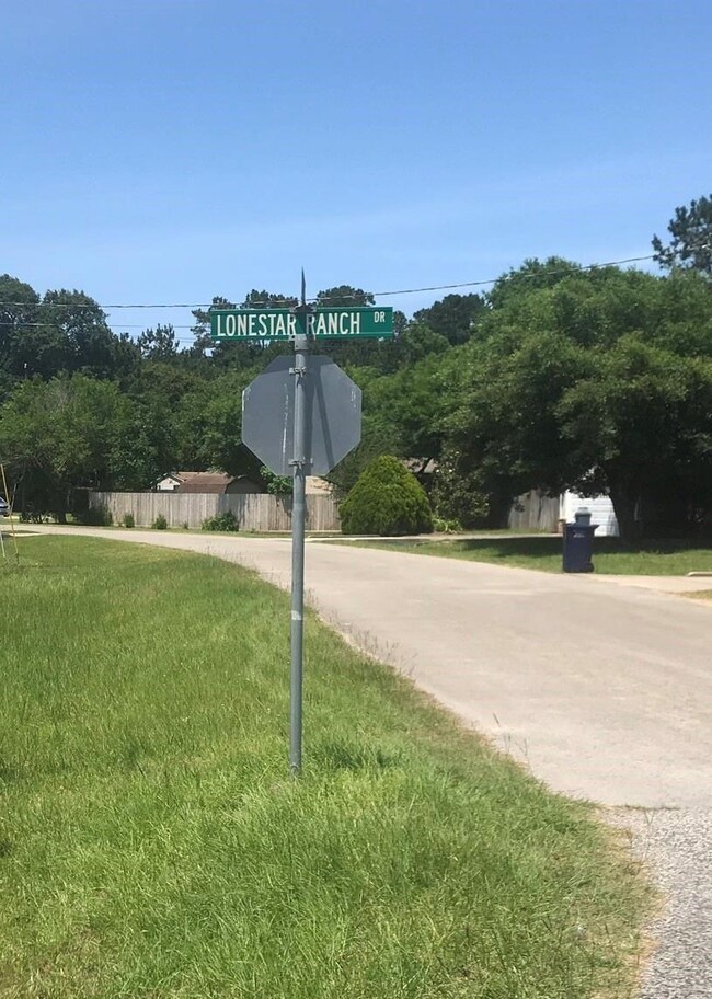 This lot is located at the corner of Lone Star Ranch & Wild Oak Ln.