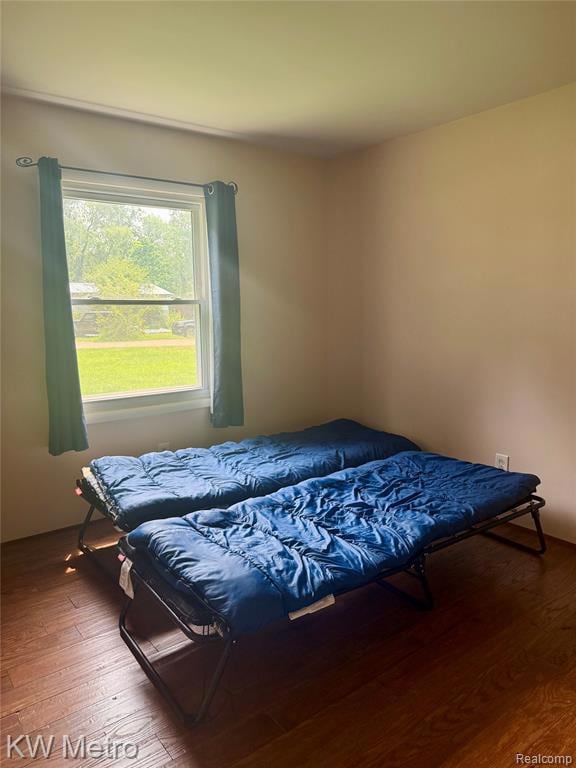 View of grassy yard with a water view