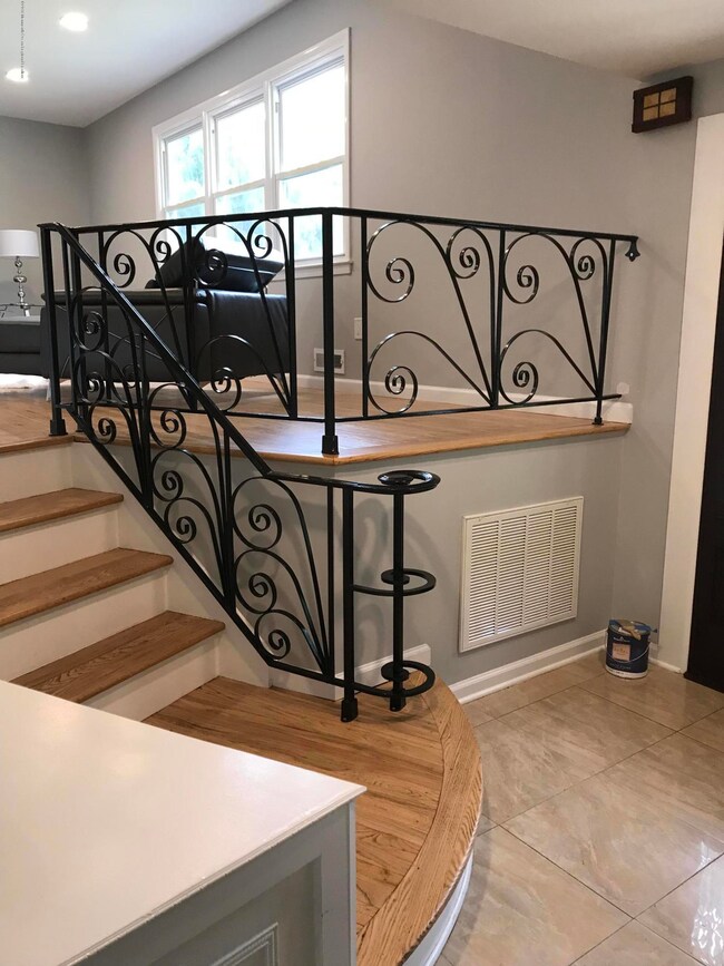 Stairway with wrought iron banister