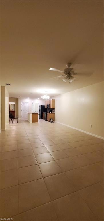 Unfurnished living room with light tile patterned 
