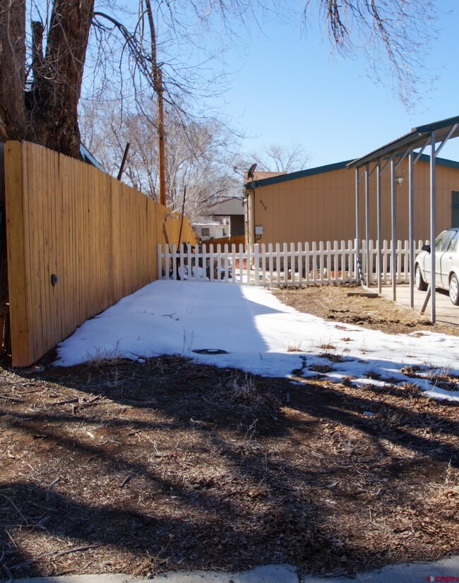 Room to park on either side of Carport