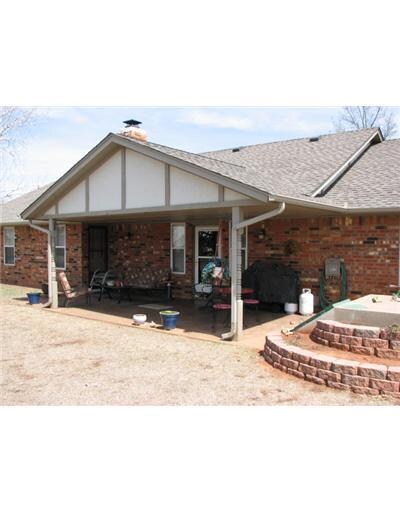 Exterior Back. Large Covered Patio