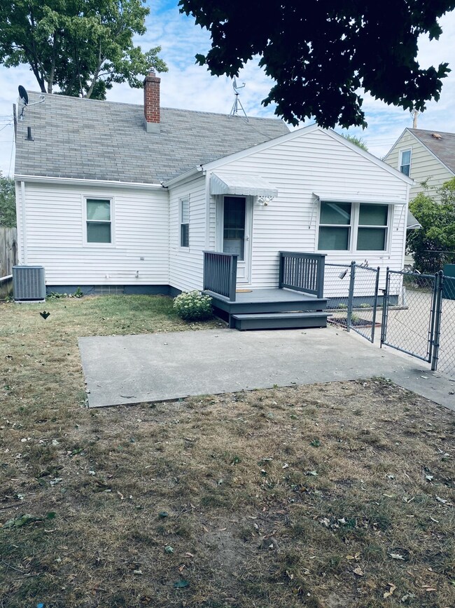 BACK OF HOME AND BACK ENTRANCE
