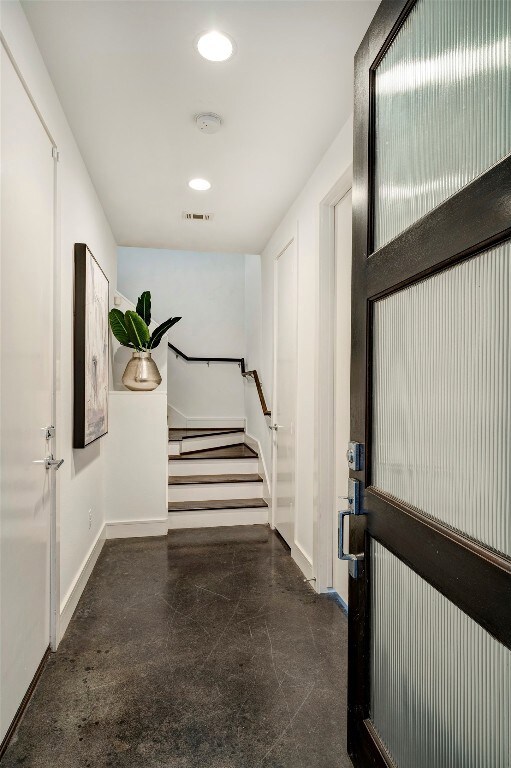 Once inside you are greeted by stunning concrete f
