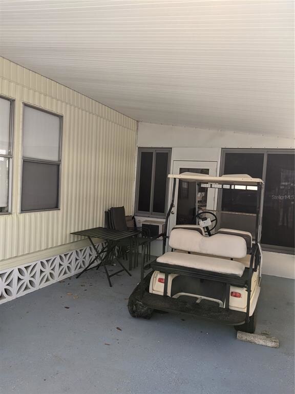 Carport with door into Florida Room