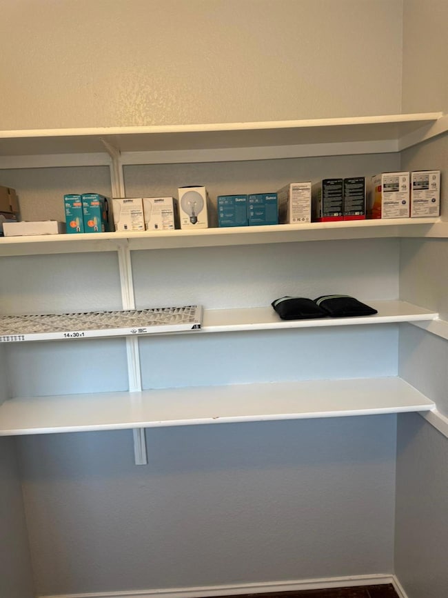 Detailed view of a textured wall and baseboards