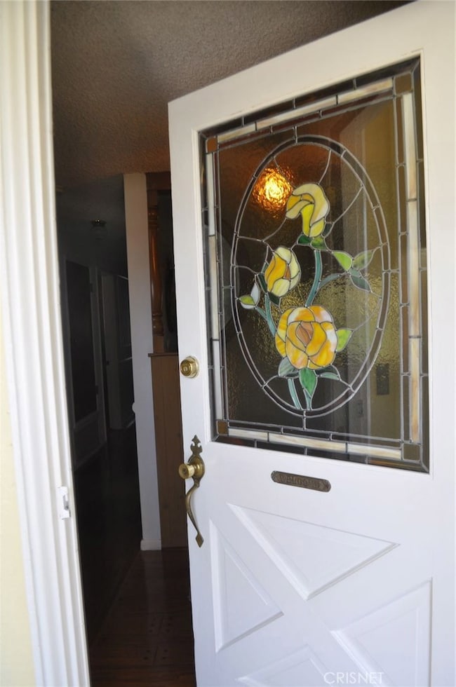 WITH AN OPEN DOOR WITH STAINED GLASS