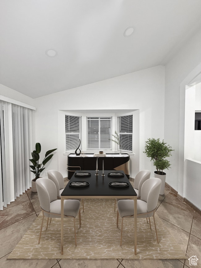Sitting room featuring lofted ceiling and recessed lighting