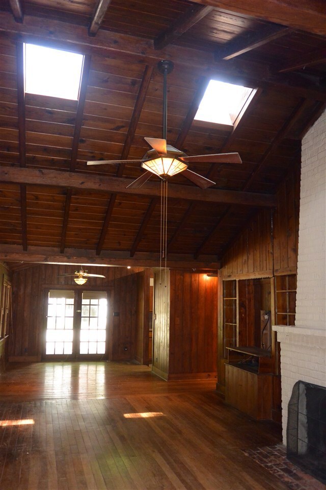 Soaring ceiling with skylights.