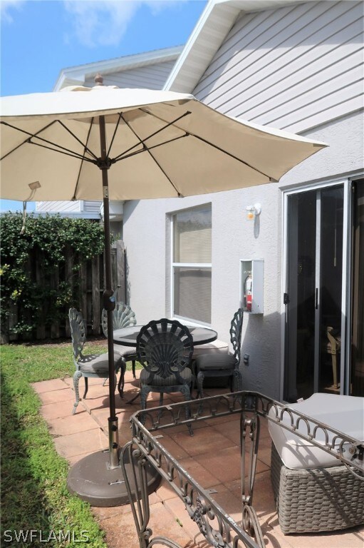 Private Back space patio-sliders to MBR