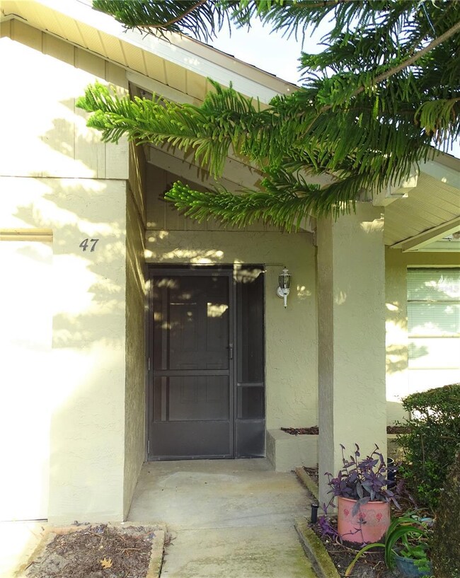 covered screened front entry