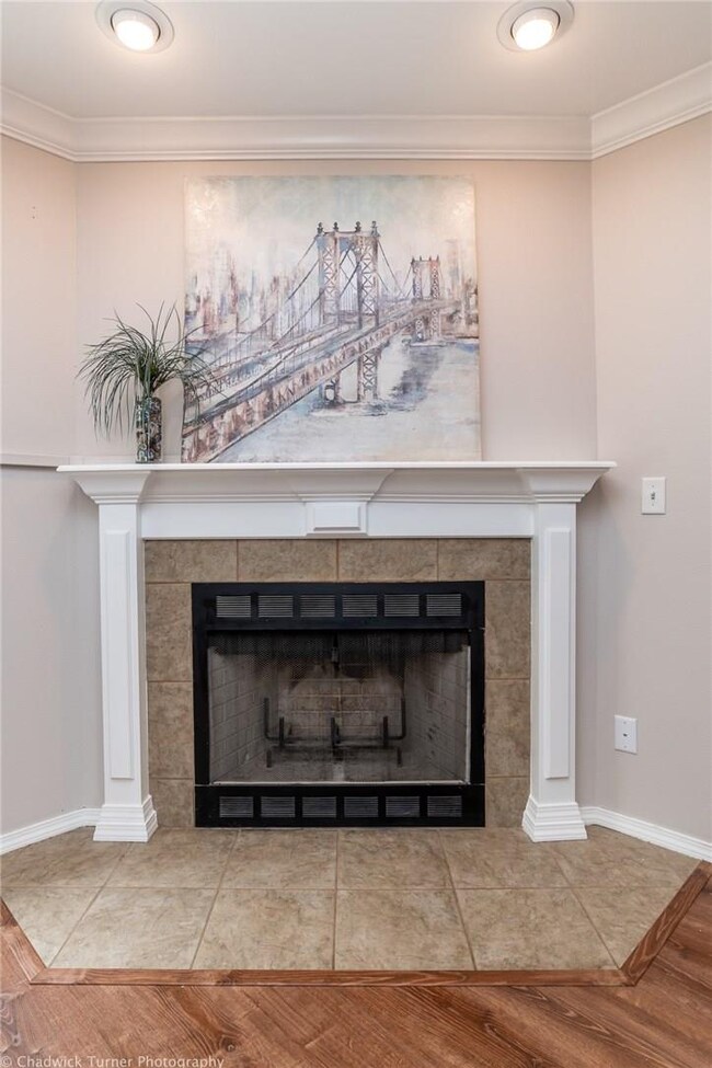 Wood Burning Fireplace Framed With Very Appealing Mantle