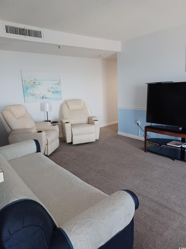 View of carpeted living room