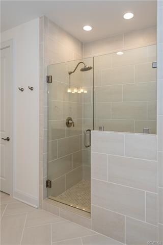 Master suite bath includes designer shower with fr