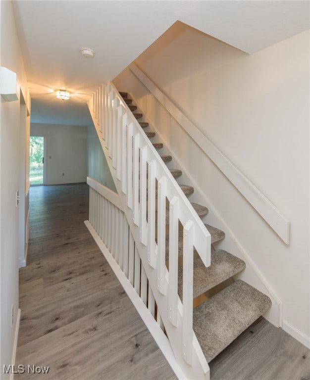 Stairway with wood finished floors