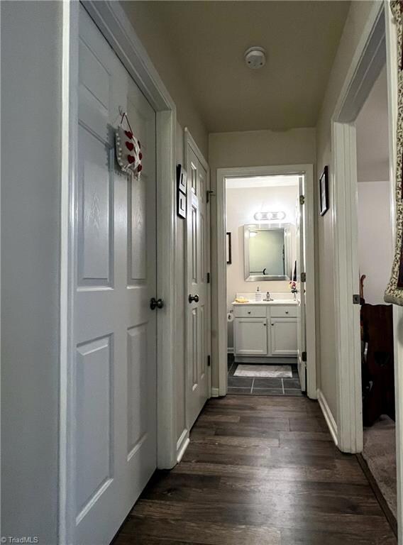 After entering, this hall to the right includes the 2nd bath and bedroom.  The laundry room is on the left.
