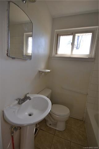 Bathroom w tile floor