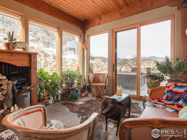 Enclosed sunroom with deck access