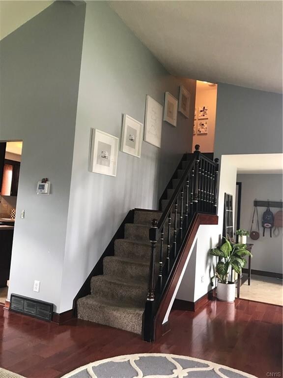 The open floorplan of this home is AMAZING! Check out these cathedral ceilings! So much space.
