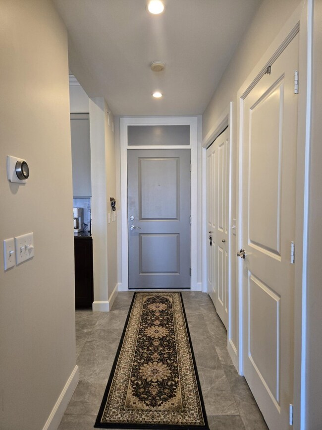 Wide hallway/entryway. As you enter kitchen is on