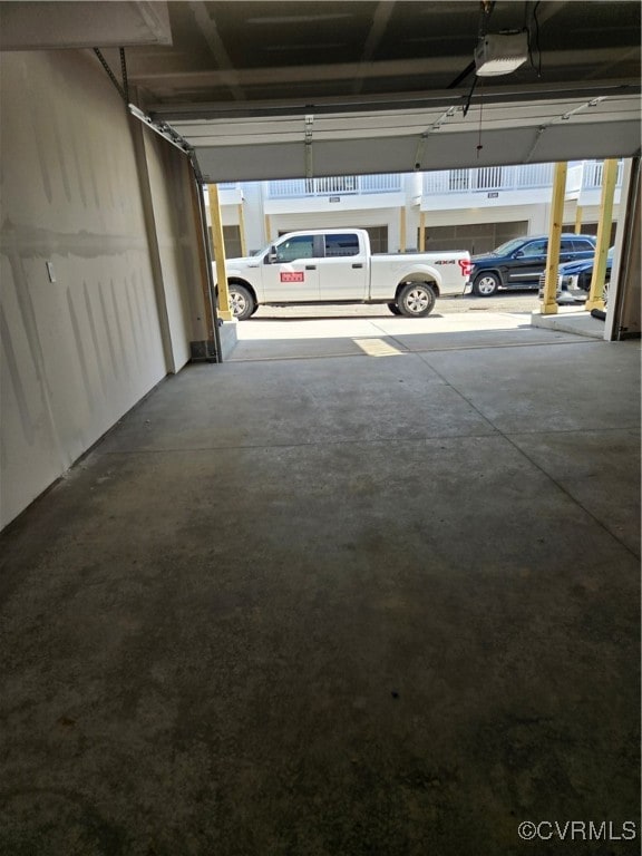 Garage featuring a garage door opener
