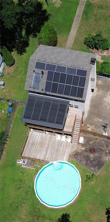 Aerial view of solar power system to home.