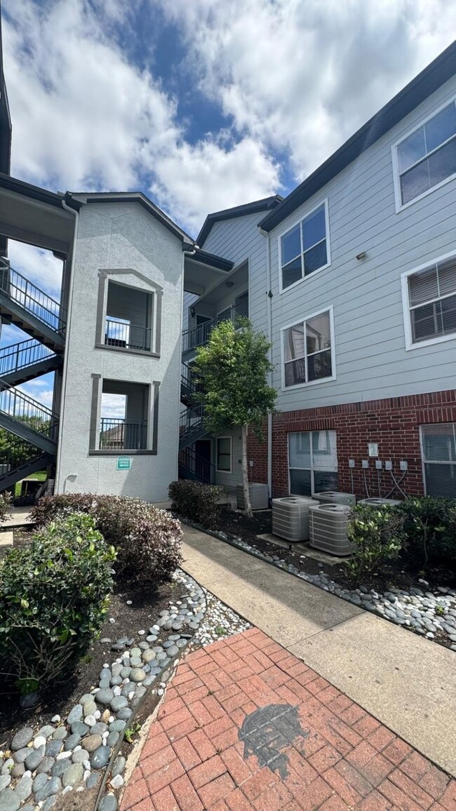 This photo showcases a modern apartment building w