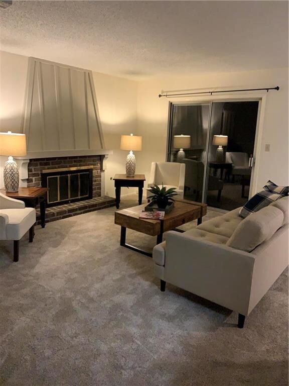 Enjoy the fireplace in the spacious GREATROOM