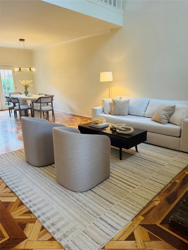 Spacious open-concept living and dining area with