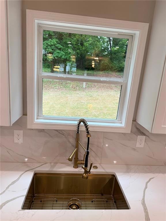 Kitchen featuring a center island, a sink, gas coo
