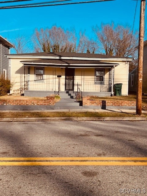 View of front facade featuring covered porch