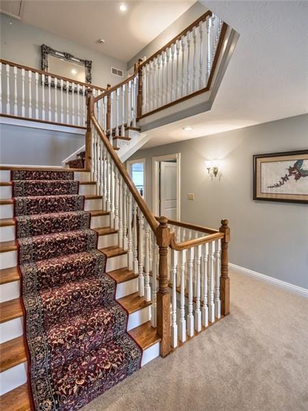 3 Story Winding Staircase with Balcony Overlooks.