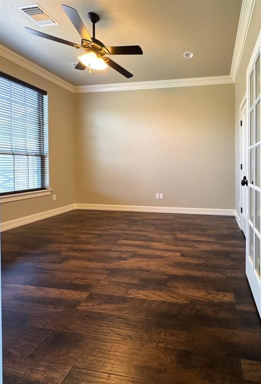 Spare room with dark wood-style flooring, ornamental molding, ceiling fan, and recessed lighting