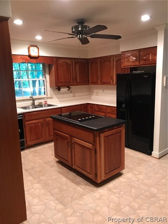 Additional view of kitchen with center island glas