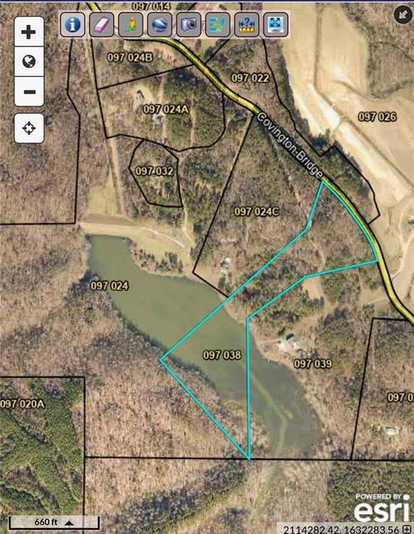 Aerial overview of property's location featuring property boundaries highlighted