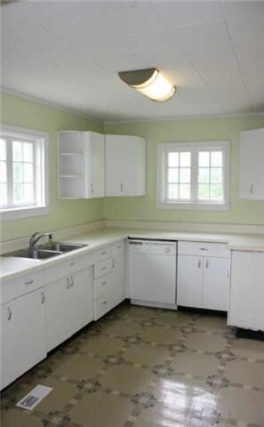 The door to the basement is just to the right in this picture