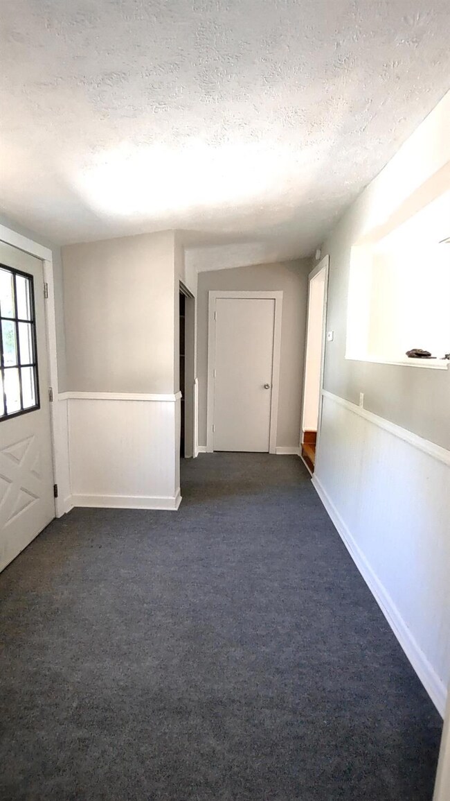 entry with new flooring and fresh paint