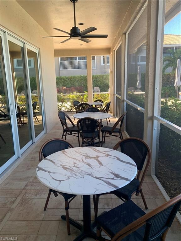 Clubhouse screened patio with ceiling fan