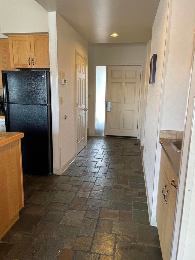 Front Door entry hall into kitchen