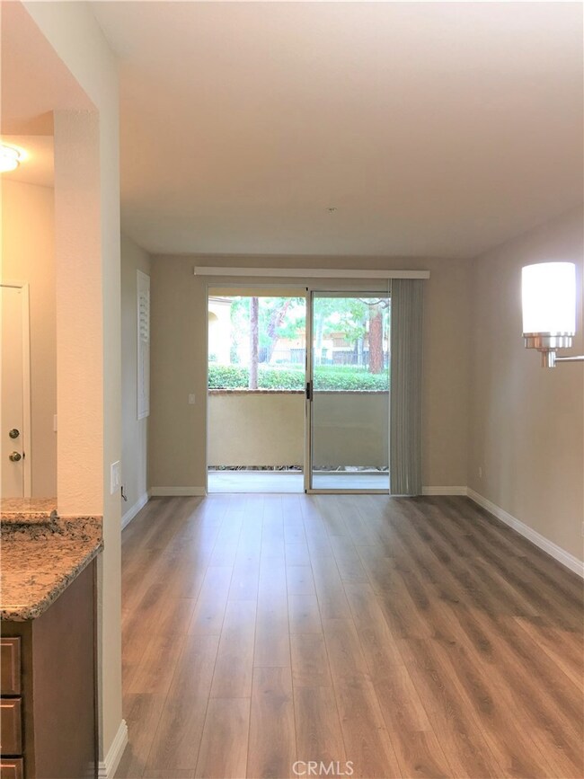 From the dining room looking towards the living room and patio slider doors.