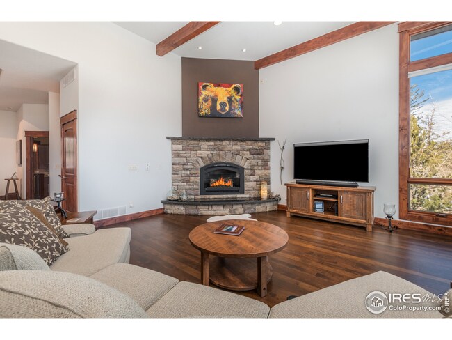 Great room has stone fireplace